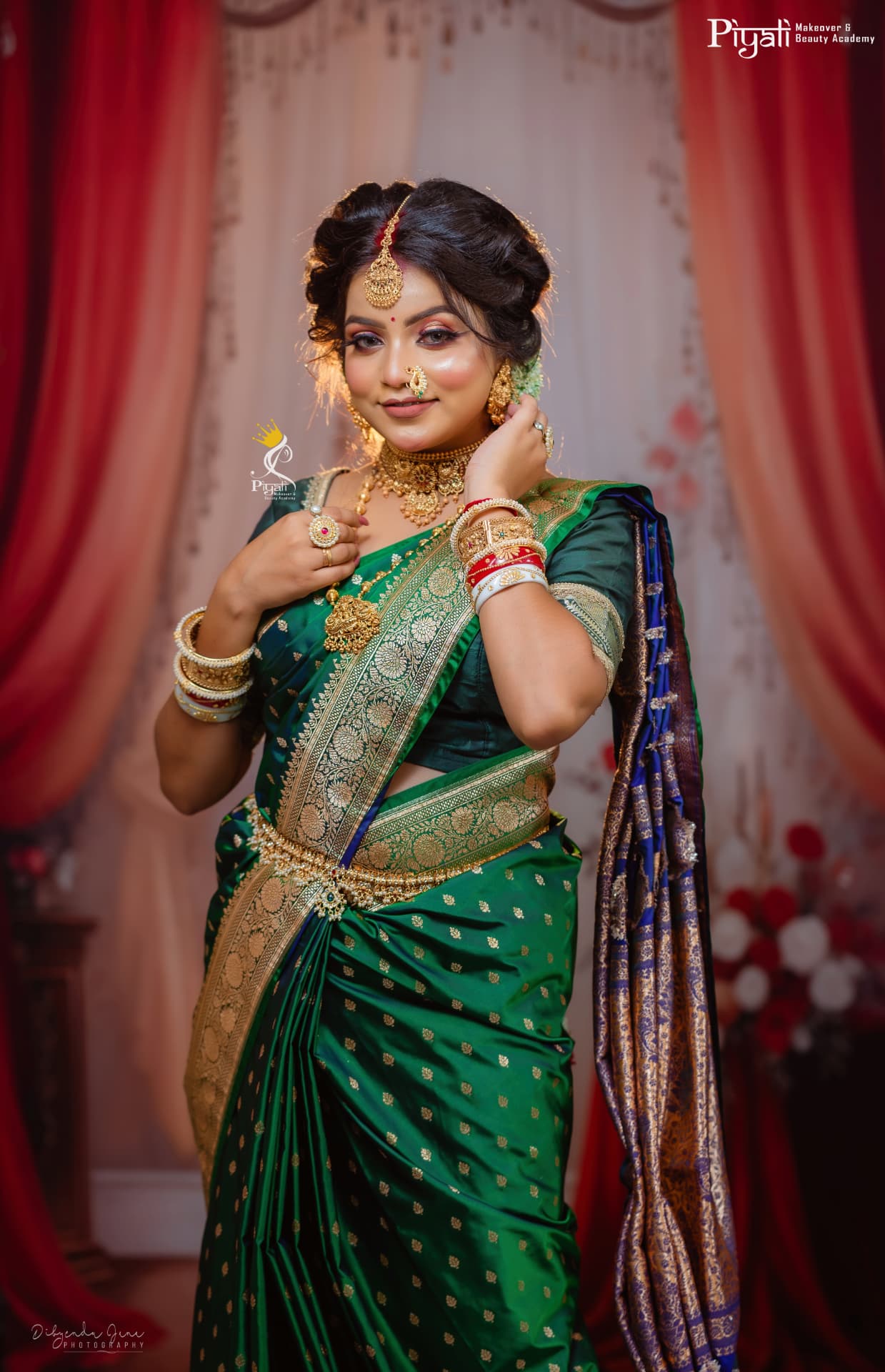 Bride in an emerald green benarasi sari with statement gold jewellery